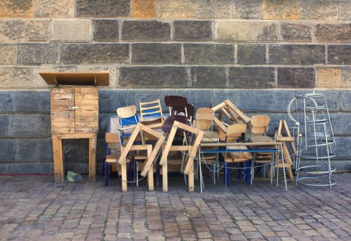 A collection of old furniture ready for disposal