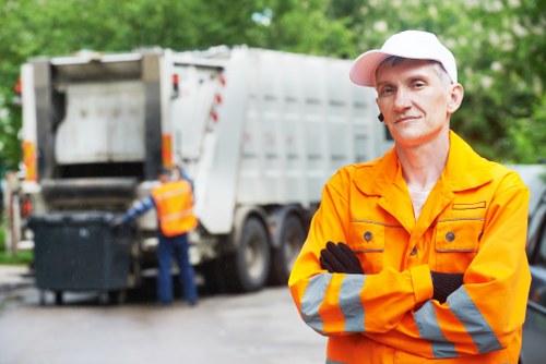 Business professionals overseeing waste removal