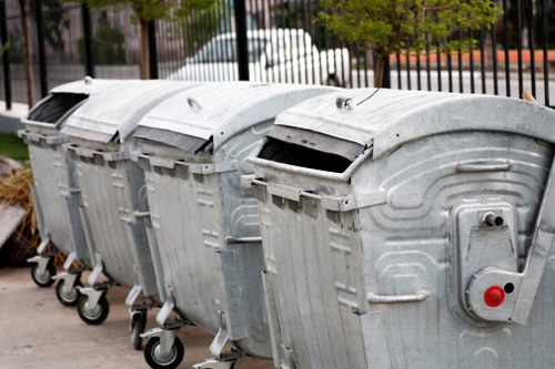 Piles of sorted recyclables including metals and electronics