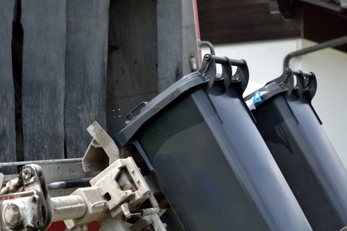 Workers managing construction waste