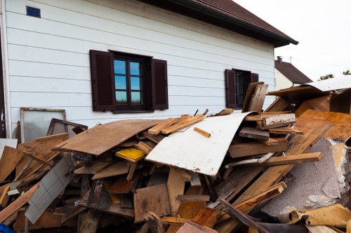 Professional junk removal team handling large items